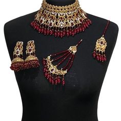 Pakistani jewellery set. Set includes - Earrings  Necklace  Tikka Jhumar