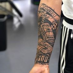 a person with a tattoo on their arm