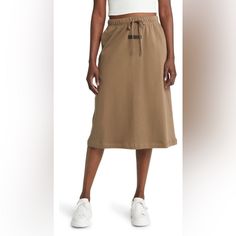 Crafted From Supersoft Cotton , This Midi Skirt With A Comfortable Drawstring Waist Offers A Modern Minimalist Appeal. Elastic/Drawstring Waist 100% Cotton Relaxed Midi Skirt With Drawstring, Casual Beige Drawstring Skirt, Casual Beige Skirt With Drawstring, Relaxed Drawstring Skirt, Casual Beige Skirt For Daywear, Mid Skirt, Cotton Midi Skirt, Fear Of God Essentials, Fear Of God