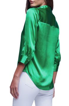 This elevated version of the classic button-up is cut from lustrous silk charmeuse with a smooth drape. 27" length (size Medium) Front button closure Spread collar Three-quarter sleeves with button cuffs Curved hem 100% silk Dry clean Imported via C Green Silk Button-up Blouse, Sleek Satin Blouse With Buttons, Spring Satin Blouse With Button Closure, Green Silk Top With Button Closure, Spring Satin Blouse With Buttons, Satin Blouse With Buttons For Spring, Sleek Silk Spring Blouse, Green Silk Blouse With Button Closure, Chic Half Sleeve Formal Blouse