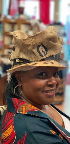 This is truly the the art of fashion hats This Zulu style hat can be worn Year round . This hat has 6 different looks. Every turn there is a different look. The  hat has hand painted Adrinka symbols on the crown. Don't delay order yours today. Unique Brown Hat With Curved Brim, Brown Cap Costume Hat, One Size Fits Most, Unique Brimmed Hats For Festivals, Unique Brimmed Festival Hats, Brown Hats One Size With Curved Brim, Unique Hats With Curved Brim, One Size, Unique Hats With Curved Brim, Artsy Brimmed Hat For Festivals, Unique Adjustable Brimmed Mini Hat