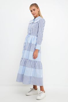 Look stylish and feel comfortable with the Stripe Block Maxi Dress. This relaxed-fit maxi-length dress features a striped pattern and long sleeves for the perfect balance between style and functionality. Its shirt dress design ensures long-lasting wear. Stripe block Maxi length Relaxed fit Long sleeves Shirts dress Tiered skirt Pocket at chest Tie at waist Front button closure Lining Hand wash cold Do not bleach Do not tumble dry Iron low Shell: 100% Cotton Contrast: 100% Cotton Lining: 80% Polyester 20% Cotton HN2041D Total length: 51" Bust:37.25 " S BLUE: Height 5'10.5" / Bust 32" / Waist 24" / Hip 36.5" Spring Striped Long Sleeve Maxi Dress, Striped Long Sleeve Maxi Dress For Work, Striped Long Sleeve Maxi Dress For Daywear, Spring Striped Maxi Dress For Work, Striped Maxi Dress For Workwear In Spring, Casual Striped Maxi Dress For Work, Striped Maxi Dress For Daywear, Long Sleeve Dresses With Vertical Stripes For Daywear, Blue Vertical Stripes Dress For Daywear