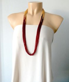 "Boho necklace for women, burgundy necklace. More items in garnet: https://www.etsy.com/shop/StephanieMartinCo?ref=seller-platform-mcnav&search_query=garnet It has 8 strands and measures 33\" ❤ PROCESSING AND SHIPPING Most orders are made and shipped out in one business day. Please check delivery timeframes for your location on the description below.  ❤ CUSTOM ORDERS If you like this item in a different color, send me a message indicating: color, size and quantity needed. I will send you a link for a \"custom order\" and you'll be able to place the order there.  If you like this item with some variations such as thickness or style, please also send me a message and I will work with you! Go back to my shop: https://www.etsy.com/shop/StephanieMartinCo See more fabulous necklaces here: https: Elegant Handmade Red Long Necklace, Handmade Elegant Burgundy Necklaces, Elegant Handmade Burgundy Necklaces, Elegant Handmade Burgundy Necklace, Gold Beaded Necklace, Garnet And Gold, Necklace Layered, Necklace For Her, Gold Bead Necklace