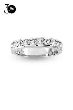 a white gold wedding band with diamonds on the outside and in the middle, it is set