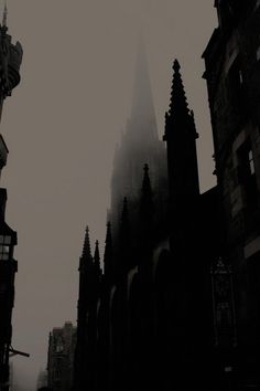 an image of a gothic cathedral in the fog