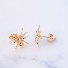 14K 18K Real Gold Spider Earrings, Spooky Creepy Stud Gold Earring, Gold Halloween Spider Earrings Great Gift For Her, Christmas Gift Material: Solid Gold (no gold-filled or gold plated) Karat: 14 Karat (585), 18 Karat (750) Available gold color: Yellow, rose, and white Available closure type: Push-back or screw-back (optional) Small Spider : 10mm x 9mm Big Spider : 13mm x 11mm   M o r e * F r o m * U s  Goldstore Jewelry - https://etsy.me/3gHtcrZ * Urn Necklaces - https://etsy.me/2Asb4BM * Bar Necklaces - https://etsy.me/2MhoVxO * Name Necklaces - https://etsy.me/3cid2Cg * Zodiac Necklaces - https://etsy.me/3cj8Q55 * Sideways Letters - https://etsy.me/2XKDhfb * Star Necklaces - https://etsy.me/2XhLXe7 * Cross Necklaces - https://etsy.me/2TYqqoy * Evil Eye Bracelets - https://etsy.me/2MfEV Handmade Gold Halloween Earrings, Handmade Gold Earrings For Halloween, Nickel-free Gold Novelty Earrings, Gold Novelty Pierced Earrings, Nickel-free Novelty Gold Earrings, Novelty Gold Nickel-free Earrings, Gold Novelty Drop Earrings, Gold Novelty Earrings For Halloween, Gold Jewelry For Halloween