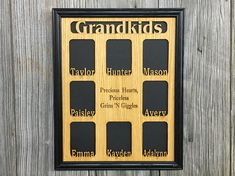 a wooden plaque that says grandkids on the side of a building with black and gold lettering