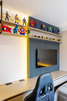 a room with a bed, desk and shelves filled with toy figurines on the wall