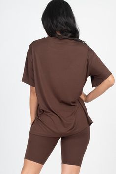 The Ciara Short Set is the perfect day-to-night look. This two-piece biker style shorts set is made from a loose fit stretch knit top for all-day comfort. Make a fashion statement with this chic and stylish look. 92% Polyester 8% Spandex This style is sold online only. Brown Stretch Top For Loungewear, Solid Color Athleisure Tops For Loungewear, Chic Solid Activewear For Loungewear, Trendy Relaxed Fit Biker Shorts For Loungewear, Trendy Brown Tops For Loungewear, Relaxed Fit Workout Top Short Length, Chic Short Length Top For Loungewear, Chic Short Length Loungewear Top, Trendy Short-length Loungewear Top