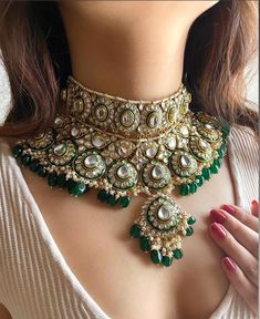 Adorn yourself in timeless elegance with this exquisite Green kundan necklace set, perfect for weddings and special occasions. Crafted with meticulous attention to detail, the set features delicate green  hues and back meenakari reminiscent of Pakistani and Punjabi traditions, with a touch of Bollywood glamour. Complete with matching earrings that come with earchains  and a stunning maangtika, this Indian Kundan ensemble effortlessly captures the essence of sophistication and grace. Measurements Reception Jewellery, Bollywood Glamour, Indian Wedding Jewelry Sets, Jewelry Pakistani, Kundan Necklace Set, Indian Wedding Hairstyles, Bridal Necklace Set, Kundan Necklace, Bollywood Jewelry