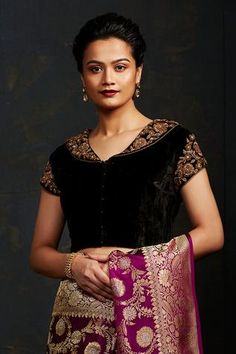 Black velvet hand embroidered zardozi shawl collar blouse in floral nakshi and dabka work.
Component: 1
Pattern: Hand embroidered
Type Of Work: Dabka work, Nakshi work
Neckline: V-neck
Sleeve Type: Cap sleeves
Fabric: Velvet
Color: Black
Other Details: 
Shawl collar
Dabka embroidery
Closure: Front hooks
Note: Saree worn by model is not for sale
Note: Due to hand dying and weaving, handloom products my vary piece to piece
Occasion: Reception, Sangeet - Aza Fashions Mirror Work Dress, Patiyala Dress, Patiala Suit, Anarkali Gown, Silk Bottoms, Glass Work, Work Dress, Embroidery Suits, Georgette Fabric