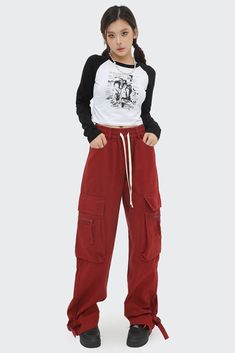 Winter Casual High Waist Parachute Pants, Casual High-waist Parachute Pants For Winter, Casual High Waist Parachute Pants For Winter, Casual High-waist Winter Bottoms, Casual High Waist Winter Bottoms, Casual Baggy Mid-rise Pants, Baggy Mid-rise Casual Pants, Casual Mid-rise Cotton Cargo Pants, Casual High Waist Bottoms For Winter