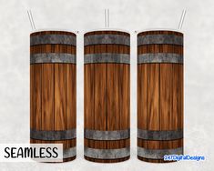 three wooden barrels with metal bands on them