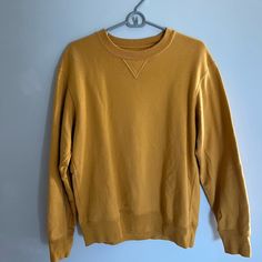 Uniqlo Sweatshirt - Yellow- Size M - Never Worn Yellow Casual Top With Ribbed Cuffs, Casual Yellow Top With Ribbed Cuffs, Casual Mustard Long Sleeve Top, Uniqlo Cotton Top For Fall, Uniqlo Cotton Long Sleeve Tops, Uniqlo Long Sleeve Cotton Top, Winter Casual Uniqlo Tops, Mustard Cotton Tops For Winter, Mustard Casual Sweatshirt For Fall