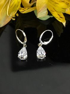 Excited to share this item from my #etsy shop: Pear Shape Earrings 5.00ctw. Leverback in Solid 14K White Gold  #4665 Classic White Gold Teardrop Earrings With Prong Setting, Classic White Gold Teardrop Earrings With Diamond Cut, Classic Teardrop Brilliant Cut Earrings, Classic Pear-shaped Earrings With Prong Setting, Classic Pear-shaped Bridal Earrings For Pierced Ears, Classic Teardrop Diamond Cut Earrings, Classic Diamond Cut Teardrop Earrings For Formal Occasions, Classic Diamond-cut Teardrop Earrings For Formal Occasions, Formal Diamond Cut Sterling Silver Teardrop Earrings