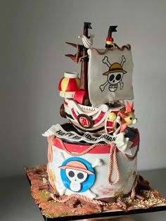 a cake decorated to look like a pirate ship