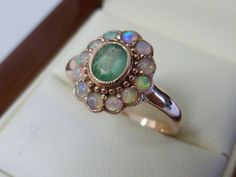 Rose Gold Emerald Ring, 9ct 9k 14k 18k Solid Gold, Vintage Opal Ring, Victorian Emerald Opal Ring -Also Avail in Various Gems- Custom, R179 by GTJewellers on Etsy https://www.etsy.com/listing/534463241/rose-gold-emerald-ring-9ct-9k-14k-18k Rose Gold Emerald Ring, Vintage Opal Ring, Gold Emerald Ring, Opal Ring Vintage, Smaragd Ring, Emerald Ring Gold, Green Opal, Opal Ring, Gorgeous Jewelry