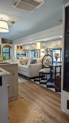 a kitchen and living room in a mobile home