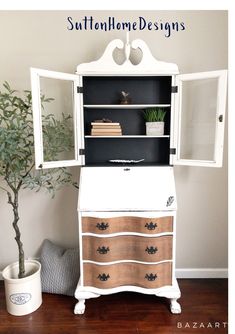 an old dresser turned into a hutch with drawers and shelves painted white, has a potted plant in the corner