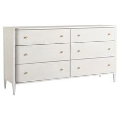 a white dresser with six drawers