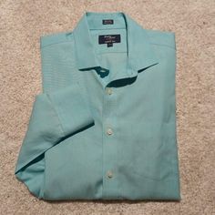 J Crew Factory * Re: $89+ * Size Medium This Item Was Purchased For An Event & Never Worn *Turquoise Hue *Long Sleeve *Point Collar *1 Chest Patch Pocket *Pearlized Button Front *2-Button Cuff/Arm *Very Nice Condition~Clean/Soft, Yet Crisp *Wrinkle Free *Rounded Hemline *2-Extra Buttons *Approx: Pit 21" * L 30" Offers Welcome * Ships Quick I'll Be Adding More J Crew Long Sleeve Shirts :) Blue Semi-formal Summer Shirt, Light Blue Dress Shirt With Spread Collar For Summer, Classic Green Short Sleeve Shirt, Blue Business Tops For Summer, Light Blue Business Tops For Summer, Light Blue Summer Top For Semi-formal Occasions, Light Blue Short Sleeve Shirt For Formal Occasions, Light Blue Summer Business Dress Shirt, Classic Light Blue Summer Shirt