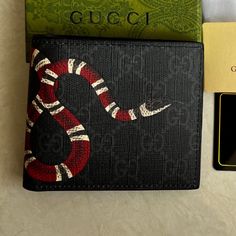 Ships Within 9-12 Days Brand New Gucci Leather Black Bifold Wallet 2 Bill Compartments 8 Credit Cards Pouches Dimension 4.3” X 3.8” Folded If You Need This Classic Leather Wallet Urgently, Please Do Not Buy It Because The Delivery Time For This Is 9-12 Days Designer Black Leather Wallet, Gucci Men Bag, Designer Black Bifold Wallet, Gucci Leather Wallets With Rfid Blocking, Gucci Leather Wallet With Rfid Blocking, Gucci Leather Wallet For Business, Designer Leather Wallet With Rfid Blocking, Gucci Leather Business Wallet, Designer Gucci Wallet With Rfid Blocking