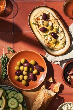 Mediterranean table setting in the evening sun featuring olives and hummus Table With Food Photography, Table Filled With Food, Food Photography Ideas Restaurants, Mediterranean Food Photography, Editorial Food Photography, Tapas Photography, Summer Food Photography, Food Photography Breakfast, Modern Food Photography