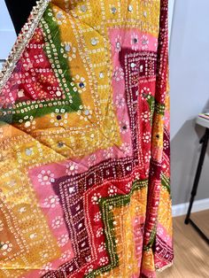 Experience the beauty of traditional Phulkari style with our Multicolor Dupatta. Made with a soft and luxurious silk finish, this dupatta features real mirror accents and stunning designs. Its heavy-weight construction makes it perfect for special occasions like Navaratri. Elevate your wardrobe with this must-have accessory. Approx 2.5 meters length End Of Season Sale, Heavy Weight, New Instagram, Accent Mirrors, Festival Wear, Special Occasion, Silk, Design