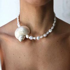 Elevate your style with our Handmade Natural Shell and Freshwater Pearl Necklace! This stunning handmade statement piece is perfect for adding a touch of summer to any outfit. Made from genuine natural shells, it's a unique accessory that will surely turn heads. Upgrade your summer look with our must-have necklace today! Material: freshwhater pearls and shells Metal type: Stainless Steel Adjustable Length Seashell Necklace, Freshwater Pearl Necklace, Choker Collar, Wedding Jewellery Necklace, Bohemian Fashion, Freshwater Pearl Necklaces, Free Spirited, Summer Look, Fashion Accessories Jewelry