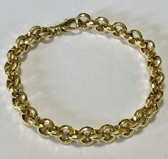 "Sleek and modern 14k yellow gold fancy cut bracelet!  ERA - Modern  METAL / MATERIAL - 14k yellow gold MARKINGS / HISTORY - Bracelet clasp is marked \"14k Italy\" CONDITION - Great condition.  SIZE / MEASUREMENTS - Length: 8 1/2 inches, Width: 9 mm, Weight: 12.15 grams" Cable Bracelets, Dark Copper, 15% Off Sale, Gold Link, Bracelet Clasps, Metal Material, Chain Link Bracelet, Chain Link, Gold Chains