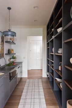 the kitchen is clean and ready to be used as a dining room or office space