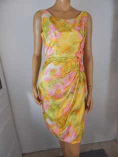 "yellow floral sarong dress vintage 1950s, rayon satin, floral applique, lined, back zipper in almost perfect condition, pinhead stain on front Katherine's Dresses Manila waist 32\" bust 40\" hip 42\" length 38\"" Yellow Vintage Silk Dresses, Vintage Yellow Silk Dress, Vintage Satin Dress, Katherine Dress, Floral 1950s Dress, Yellow Floral Print Non-stretch Dress, Vintage 1950s Sleeveless Floral Print Dress, Sarong Dress, 1960s Floral Dress