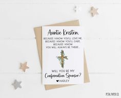 a card with an image of a cross on it and stars around it, which reads,