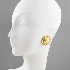 Elegant French fashion designer, Sonia Rykiel Paris signed clip-on earrings. They feature a gilt metal rounded shape with texture, topped with a large resin cabochon in light yellow champagne color. Signed underside: Sonia Rykiel - Paris.  Measurements: 1.38 in diameter (3.4 cm).  Please see the measurements noted above in the description for the best approximate dimensions. Gold Brass Cabochon Earrings, Gold Cabochon Brass Earrings, Gold Brass Earrings With Cabochon Detail, Yellow Champagne, Yellow Resin, Resin Cabochon, French Fashion Designers, Sonia Rykiel, Champagne Color