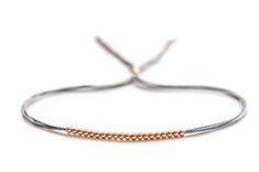 14k solid rose gold beads and soft silk make this a unique friendship bracelet which... Girlfriend Presents, Rose Gold Beaded Bracelet, Anklets Diy, Silk Bracelet, Anklet Designs, Friendship Bracelets With Beads, Rose Gold Beads, Classic Bracelets, Gold Bead Bracelets