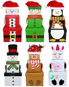 several boxes with different types of christmas decorations on top of each box, all decorated in different colors and shapes