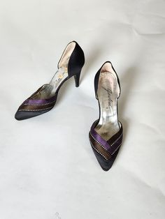 Good vintage condition Black, purple and brown satin, rhinestone trimming 5.5 ladies 8.5" toe to heel insole 3.25" heel 2.5" across ball of foot Leather sole Purple Rhinestone Pointed Toe Heels, Purple Closed Toe Heels For Evening, Purple Rhinestone Heels For Formal Occasions, Purple Rhinestones Formal Heels, Purple Rhinestone Formal Heels, Ladies Heels, Purple And Brown, Dance Heels, Womens Pumps