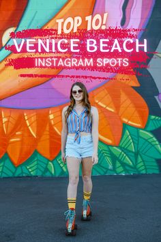 a woman standing in front of a colorful wall with the words top 10 venice beach instagram spots