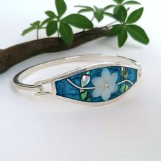 Blue Enamel Bangle Gift, Blue Enamel Bangle As A Gift, Mother Of Pearl Bangle Jewelry Gift, Blue Enamel Bangle Perfect As A Gift, Mother Of Pearl Bangle For Gift, Blue Inlay Bracelet Jewelry, Blue Inlay Bracelet, Turquoise Flower-shaped Jewelry For Wedding, Turquoise Flower Jewelry For Wedding