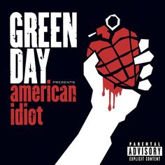 an ad for green day with the image of a hand holding a piece of food