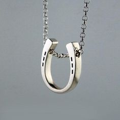 Classic Horseshoe Pendant Necklace Sterling Silver Horseshoe-shaped Jewelry With Adjustable Chain, Classic Horseshoe Jewelry As A Gift, Silver Horseshoe Necklace For Gift, Horseshoe Necklace With Adjustable Chain For Gift, Horseshoe Necklace With Adjustable Chain As Gift, Horseshoe-shaped Jewelry With Adjustable Chain For Gifts, Silver Horseshoe Necklace Nickel Free, Nickel-free Silver Horseshoe Necklace, Horseshoe Jewelry With Adjustable Chain For Gifts