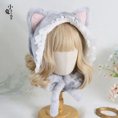 Cat Ears Bonnet: A Whimsical Blend of Style and Cuteness Introducing our Cat Ears Bonnet, the perfect accessory to infuse your outfit with charm and playfulness. This bonnet is more than just headwear; it's a fashion statement that adds a touch of cuteness and personality to your look. Whether you're heading out for a casual stroll, dressing up for an event, or simply want to embrace your inner feline spirit, this cat ears bonnet is the ideal choice. Adorable Cat Ear Design: Our Cat Ears Bonnet Christmas Elf Outfit, Kawaii Games, Christmas Tree Dress, Kawaii Bags, Kawaii Backpack, Kawaii Pens, Ear Design, Elf Clothes, Pastel Goth Fashion