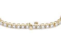 Classic for a reason, the Tennis Bracelet is an emblem of understated elegance. Ours are beautifully handcrafted in 14k gold, featuring a string of stunning lab-grown diamonds and a seamlessly secure push clasp. Diamond Icon, Halo Collection, Rock Gifts, Studded Necklace, Box Clasp, Understated Elegance, For A Reason, Emerald Diamond, Tennis Bracelet