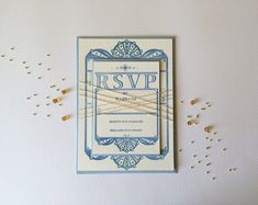 an image of wedding stationery on the back of a card with string attached to it