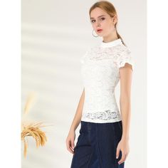 A semi-sheer top featuring an allover floral lace design, round neck, ruffle Sleeve. Great for simple fashion pants or skirts. Pair this sheer lace top with a cami top or tank top. Perfectly match with heels and a clutch bag for an elegant style. The lace blouse can show off your charming side in your daily wear. In its charming design, this top can be a good choice for the upcoming season. Spring Lace Trim Crew Neck Top, Short Sleeve Lace Top With Ruffles, Elegant Crew Neck Lace Top With Lace Trim, Stretch Feminine Lace Top With Lace Trim, Feminine Stretch Lace Top With Lace Trim, Short Sleeve Tops With Delicate Lace For Spring, Lace Top With Lace Collar For Spring, Non-stretch Lace Trim Top For Spring, Spring Lace Tops With Lace Collar