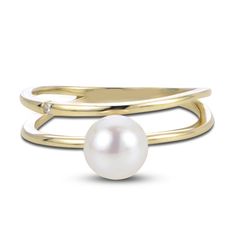 A lustrous freshwater cultured pearl shimmers with elegance in the center of this magnificent women's open shank ring, fashioned in 14K yellow gold. A brilliant round diamond accent embellishes the band to complete the look.