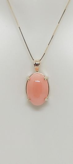 PINK CORAL Oval Pendant 14k Yellow Gold/ Necklace /Charm in 14k Yellow Gold 18 Inches box Chain for a Pink Coral LOVER. Product Info: -Stone: Oval Pink Coral. -Stone Color: Pink. -Metal: 14k Yellow Gold. -Pendant Measures: 18 x 10mm. -Pink Coral Measures: 12 x 9mm -Chain length: 18 Inches box chain. -Nice Gift Box Included. Pink Oval Fine Jewelry, Pink Cabochon Jewelry For Anniversary, Pink Oval Pendant Jewelry For Formal Occasions, Pink Oval Pendant For Formal Occasions, Pink 14k Gold Jewelry With Polished Finish, Pink Oval Gemstone Jewelry, Pink Oval 14k Gold Necklace, Peach Round Gemstone Jewelry, Round Peach Gemstone Jewelry