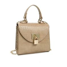 The Lock Croc Satchel Handbag In Beautiful Beige. Embossed Crocodile Vegan Leather. Can Be Carried Two Different Ways, Includes A Detachable Chain Crossbody Strap (35” Long). Fold Over Snap Closure With Faux Padlock. 6.5" Width X 6.3" Height X 3.2" Thick. New In Manufacturer Original Packaging. Msrp; $68 Beige Tote Bag With Chain Strap, Beige Top Handle Bag With Hasp Closure, Beige Travel Bag With Chain Strap, Beige Crossbody Bag With Chain Strap, Beige Crossbody Satchel With Chain Strap, Beige Bags With Chain Strap And Double Handle, Beige Double Handle Bag With Chain Strap, Everyday Beige Satchel With Chain Strap, Gold Crossbody Bag With Hasp Closure