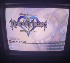 the logo for kingdom hearts is displayed on an old tv