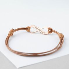 ♥ LEATHER INFINITY COORDINATES BRACELET ♥• Material: Solid 925 Sterling Silver • Finishing: Silver - Yellow Gold - Rose Gold • Word limits: 3-4 wordsH O W • T O • O R D E R1. Select your preferred CHARM COLOR and 1 SIDE / 2 SIDES ENGRAVING from the menu. 2. Select your preferred LEATHER COLOR from the menu.3. Please let us know the coordinates or messages in the "Note to GRSJewelry" section during checkout. If you don't know the exact coordinates, leave us the address and we will look up the coo Brown Leather Strap Braided Bracelet Gift, Adjustable Leather Strap Jewelry With Waxed Cord, Brown Leather Strap Wrap Bracelet Gift, Elegant Adjustable Wrap Bracelet Gift, Elegant Adjustable Wrap Bracelet For Gift, Adjustable Engraved Bracelets For Birthday Gift, Engraved Adjustable Bracelets For Birthday Gift, Silver Leather Bracelet With Sliding Knot As Gift, Elegant Adjustable Engraved Leather Bracelet